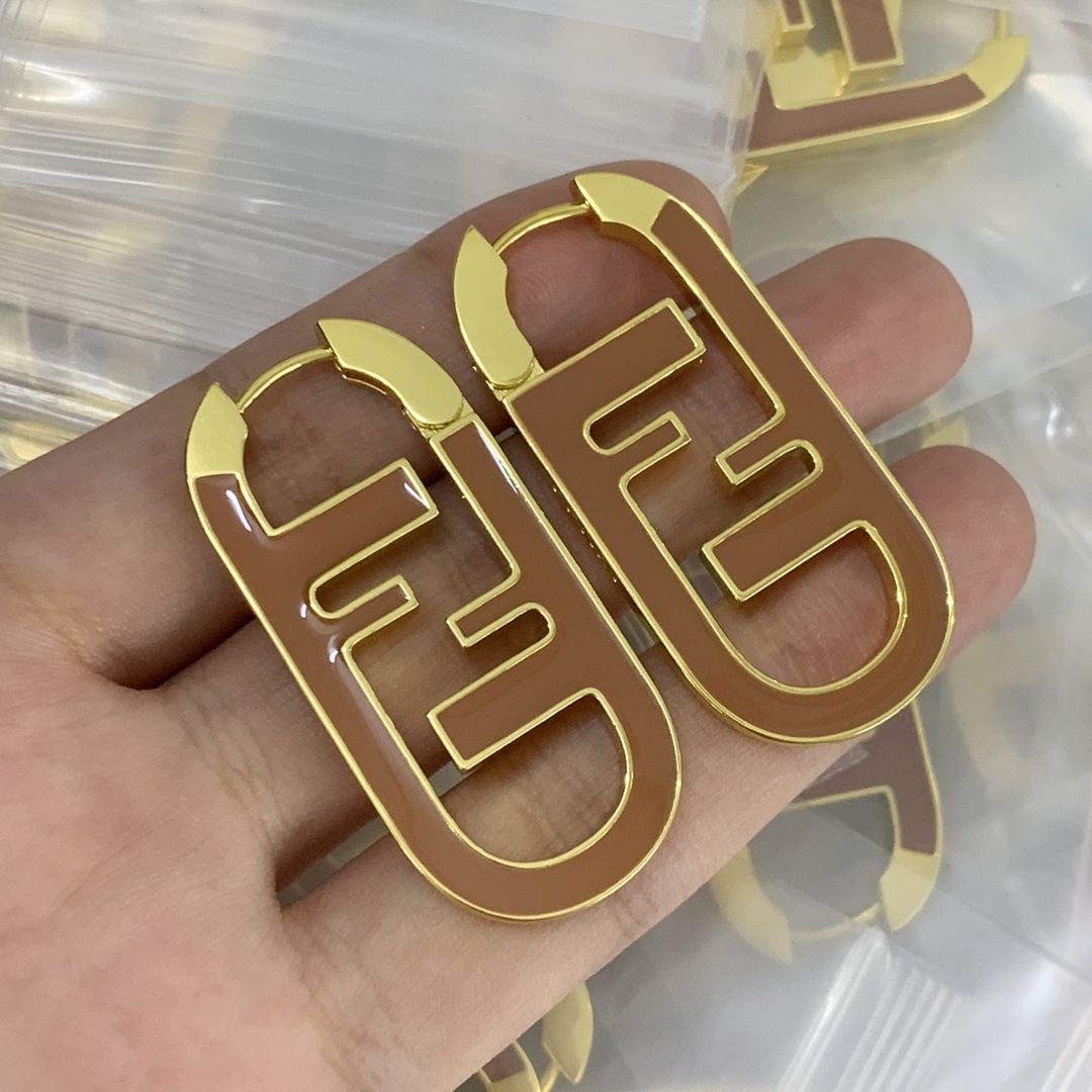 07eae000 FF Tan O'Lock Earrings - Image 1